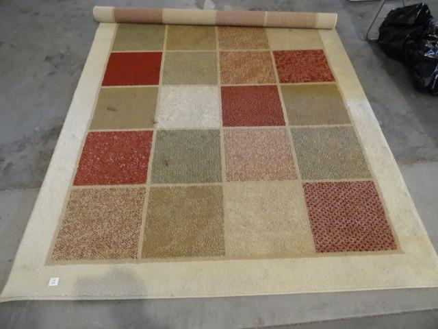 lot 56 image: 87 x 63 area rug...
