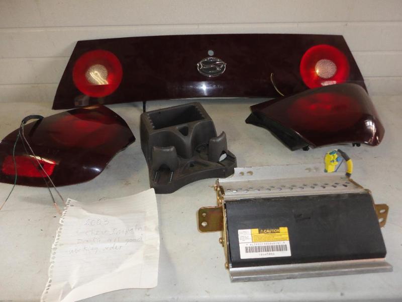 lot 42 image: 2003 Chevy Impala parts, all in wor...