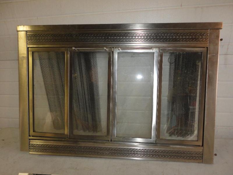 lot 43 image: Nickel fireplace face and doors, se...