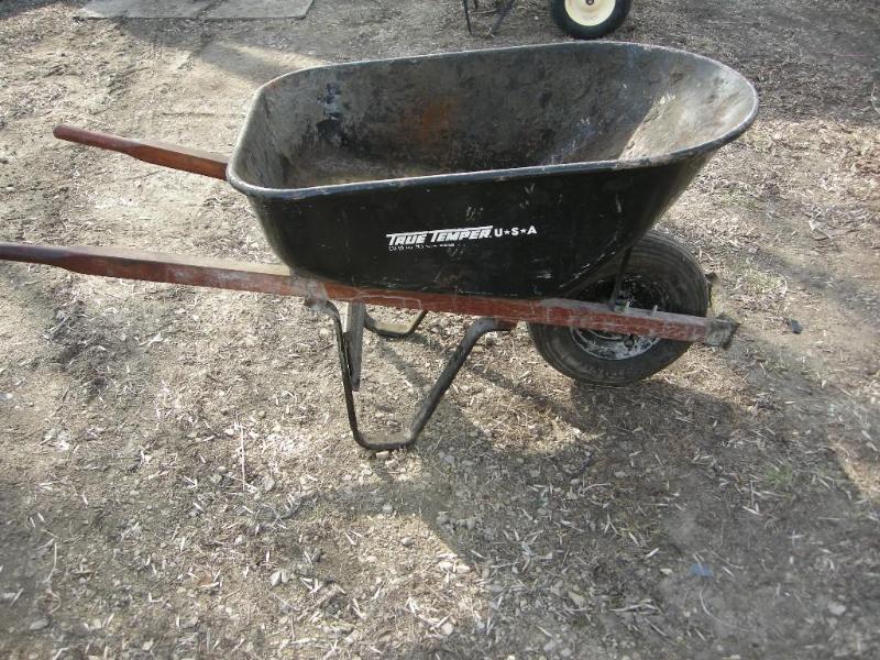 lot 121 image: True Temper metal wheel barrow. Goo...