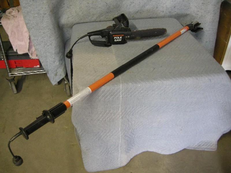 lot 138 image: Remington electric chain saw  pole...