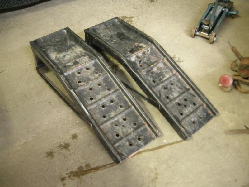 lot 17 image: Pair of car ramps. Black. 7000lb. U...
