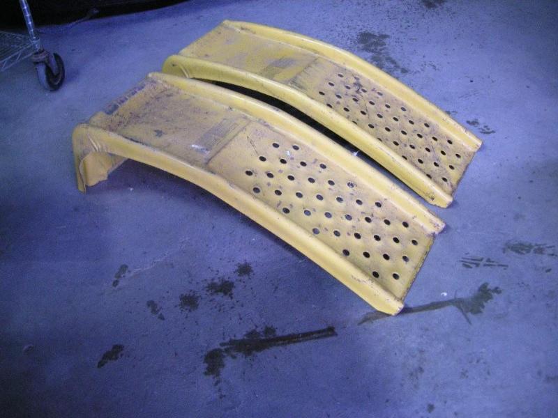 lot 19 image: Pair of car ramps, orange, USA....