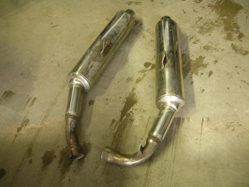 lot 23 image: 2 Honda motorcycle mufflers. HM MBB...
