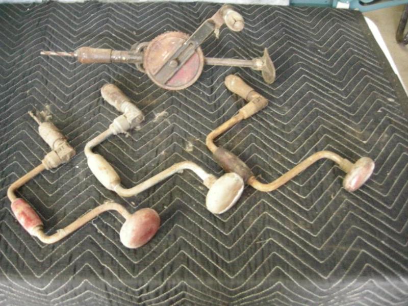 lot 27 image: 4 antique hand drillsbraces...