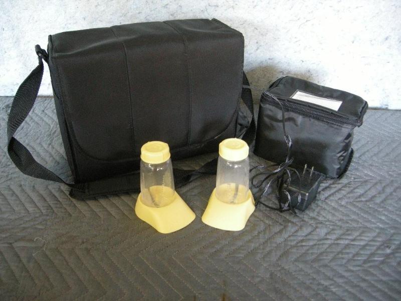lot 60 image: Medela breast pump. Used once....