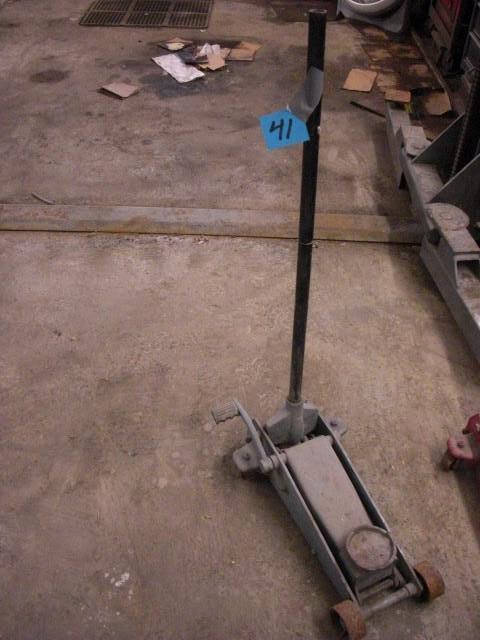 Floor Jack.. No info on weight, but...