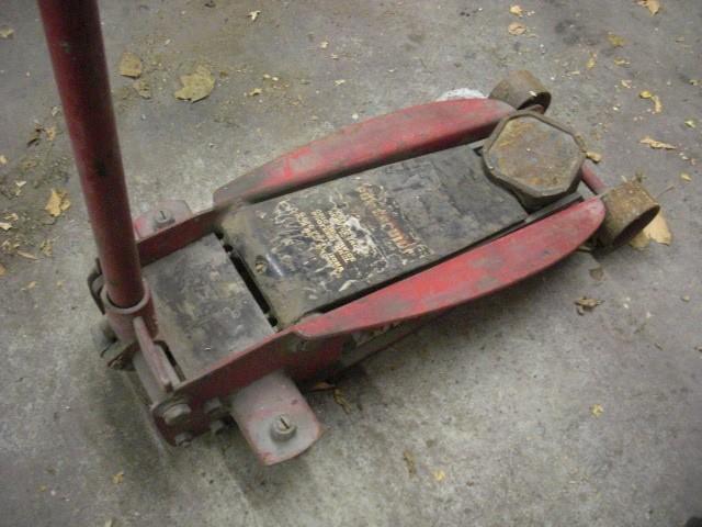 Floor Jack.. No info on Weight, but...