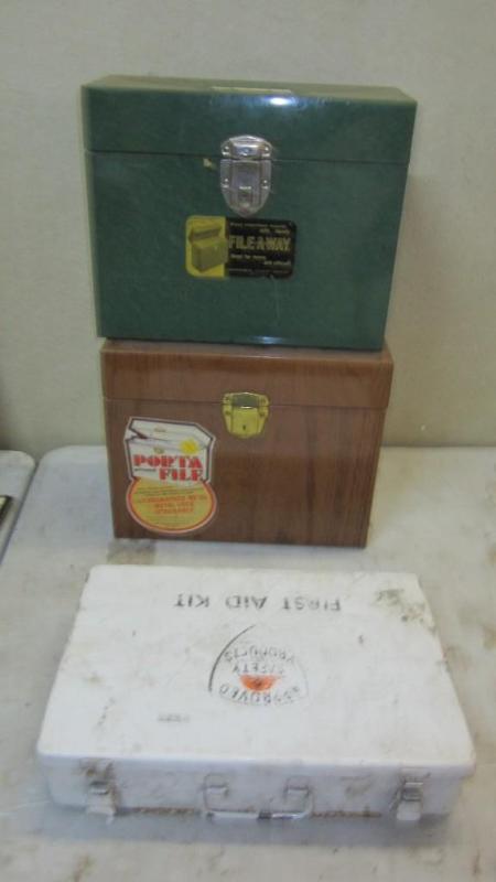 File boxes and first aid kit...