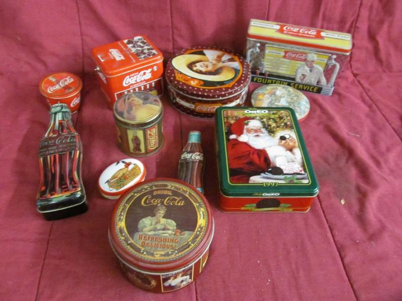lot 165 image: Group of Collectible Coca Cola Tins...
