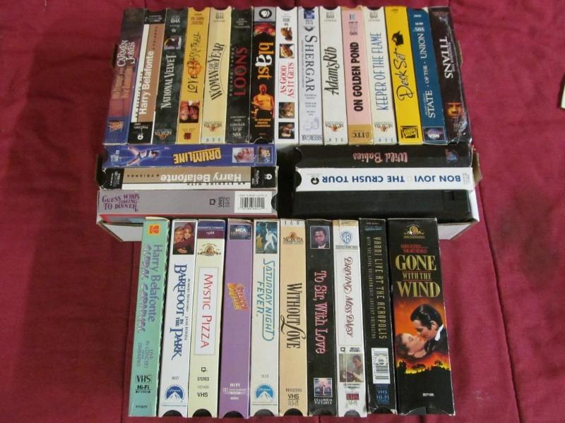 lot 206 image: 31 VHS - Remember the Titans, Desk ...