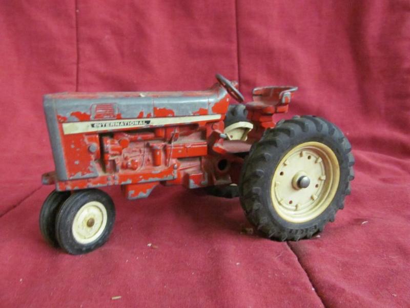 lot 239 image: International Tractor 9" Metal...