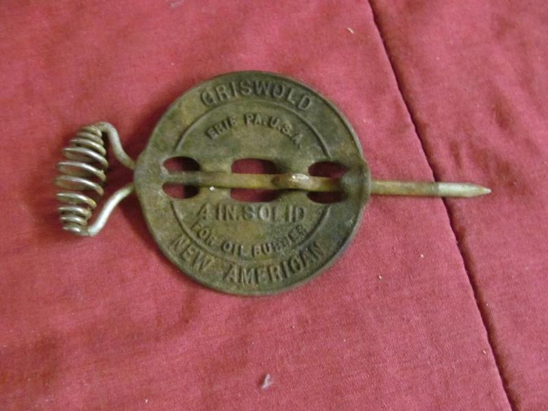 lot 80 image: Griswold Stove damper...