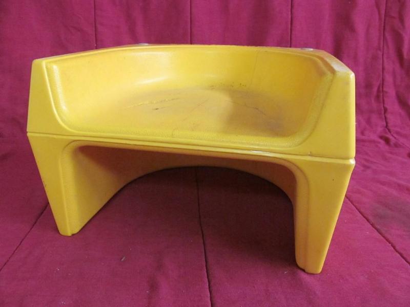 lot 86 image: Yellow Booster chair...