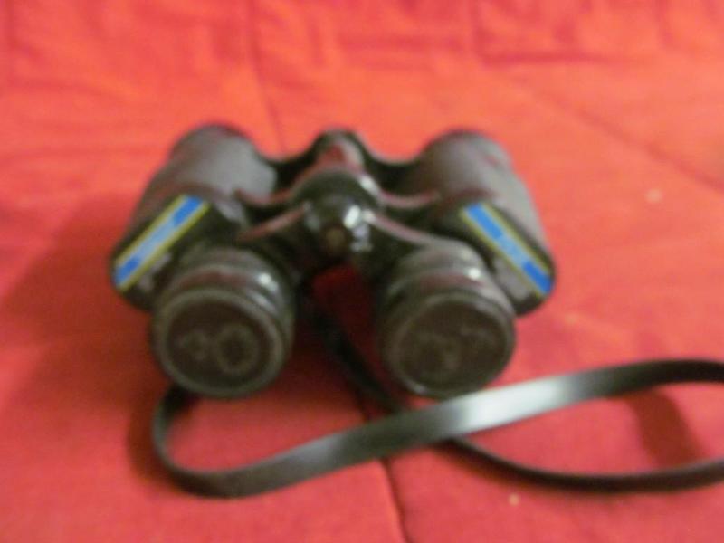 lot 92 image: Tasco 7x36 Binoculars in case -- gr...