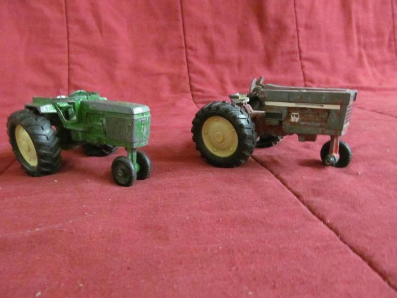 lot 93 image: 2 Old Toy Tractors -- International...