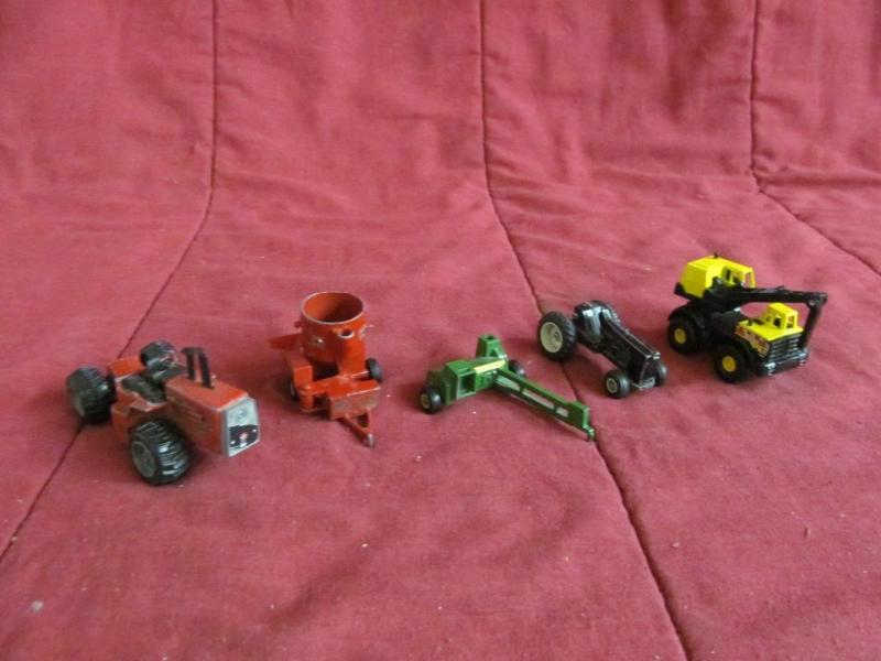 lot 98 image: Group of farm toys -- baler, feed m...