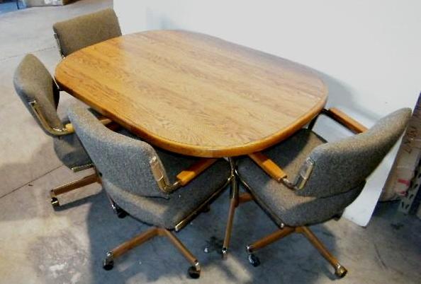 lot 143 image: Table and 4 Rolling Chairs Set by C...