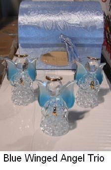 lot 48 image: Three Piece Blue Winged Angels with...