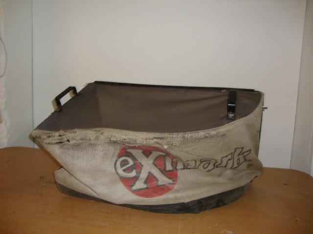 lot 47 image: Exmark Mesh Grass Bagger, some hole...