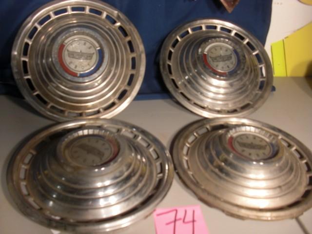4 matching FORD Hub Caps...
