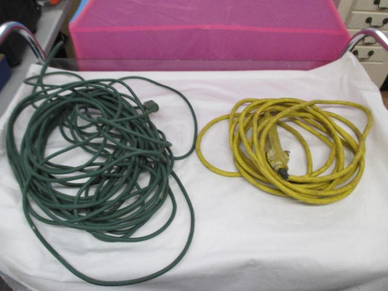 1 bar extension cord and 1 extensio...