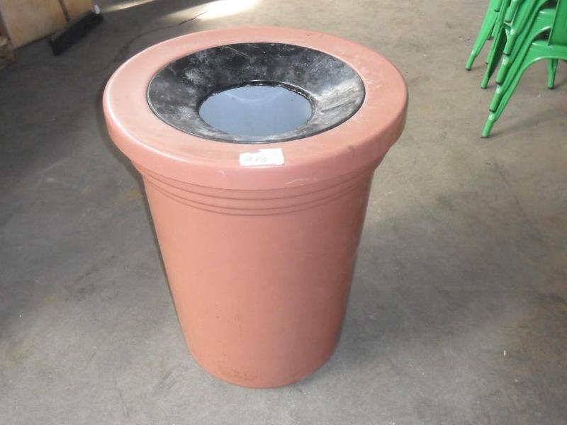 lot 19 image: Fiber glass trash barrel. Planter s...
