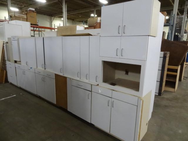 lot 1 image: 11 piece laminate cabinet set...