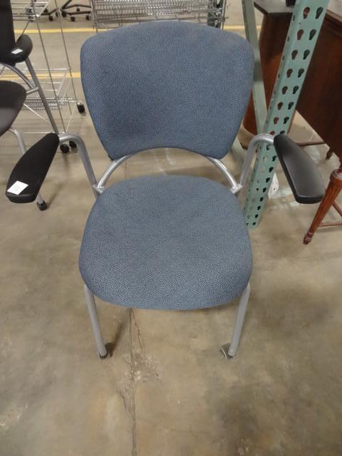 lot 112 image: Metal framed side chair on wheels....