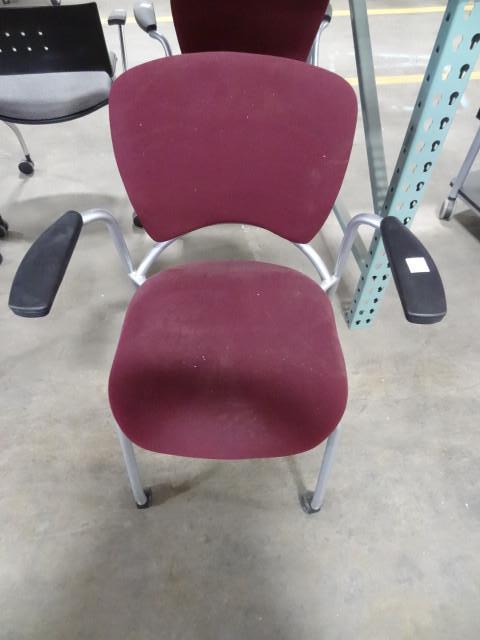 lot 126 image: Metal framed side chair on wheels....