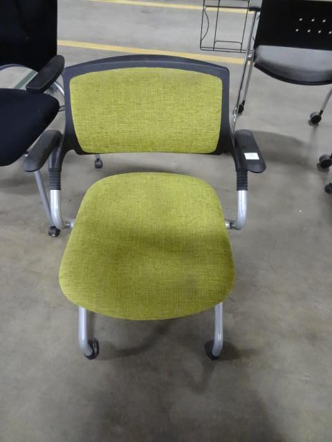 lot 127 image: Metal framed side chair on wheels....