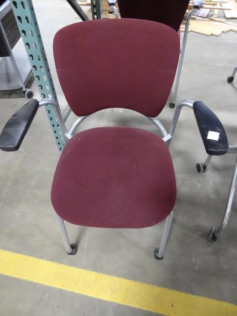 lot 155 image: Metal framed side chair on wheels....