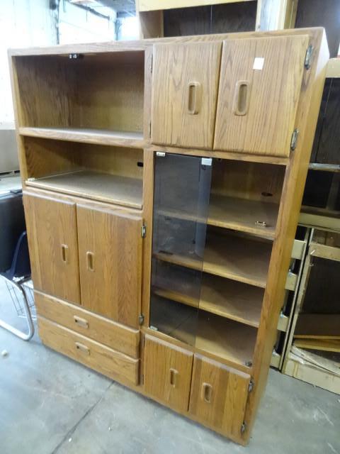 lot 17 image: Wood entertainment center. 55 x 19 ...