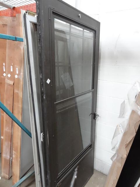 lot 214 image: 36 x 83 aluminum storm door...