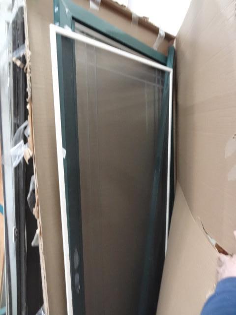 lot 215 image: 35 x 80 aluminum storm door...