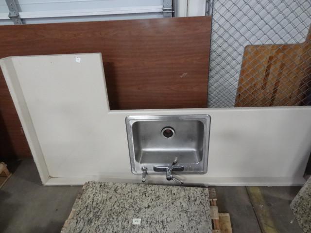 lot 234 image: L shaped counter top with stainless...