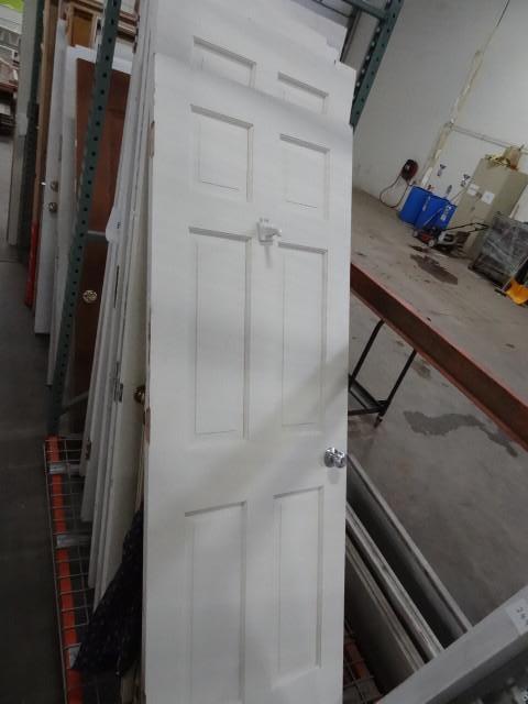 lot 250 image: 24 x 79 solid wood door...