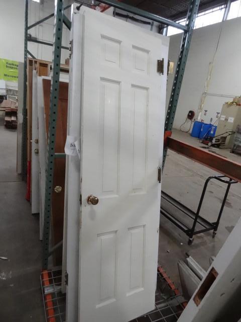 lot 255 image: 24 x 79 solid wood door...