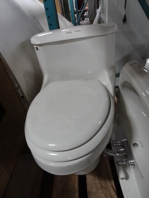 lot 42 image: One piece american standard toilet...