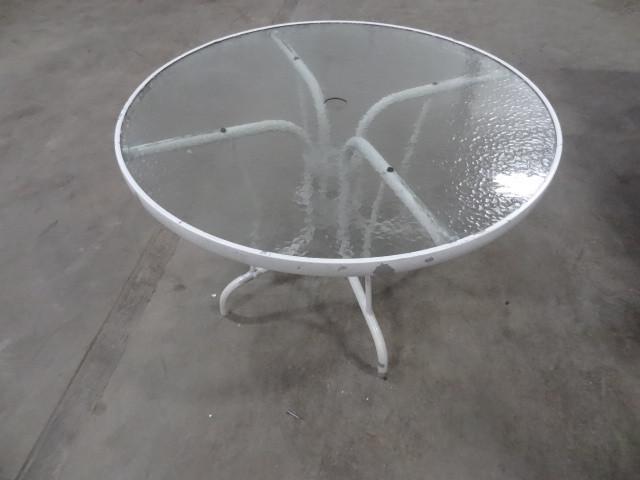 lot 79 image: 40" metal patio table with gla...