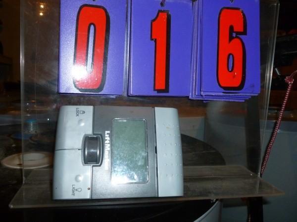 lot 16 image: Chamberland lift master garage door...