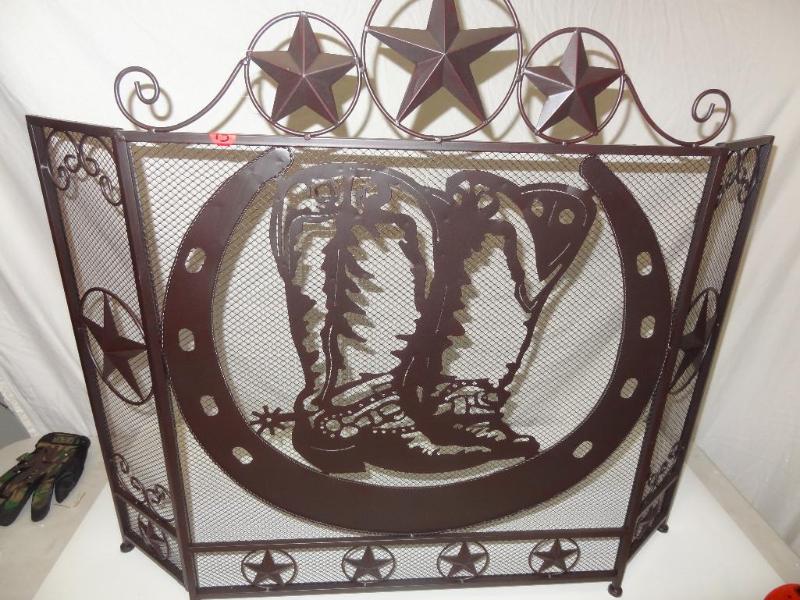 Brown metal cowboy boots and star f...