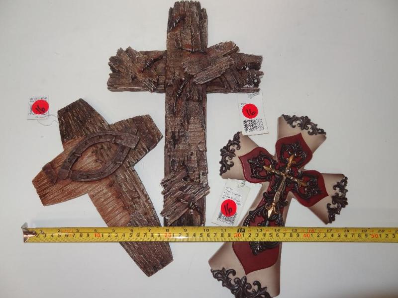 Three decorative wall crosses....