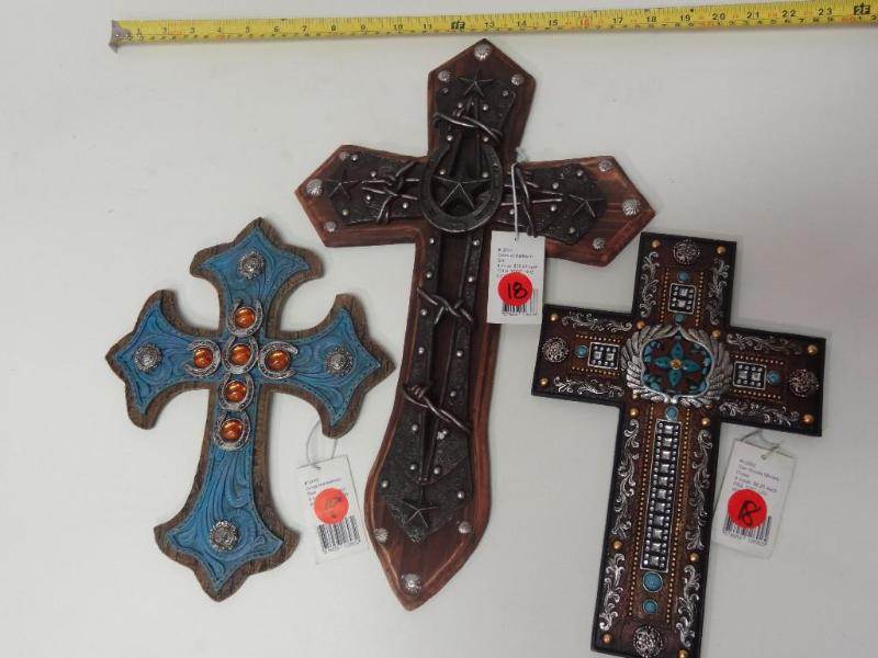 Three decorative wall crosses....