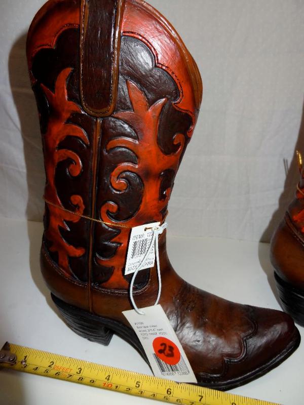 Two cowboy boot vases....