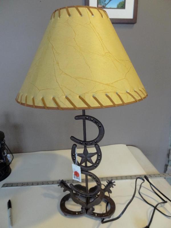 Cast iron horseshoe and spur table ...