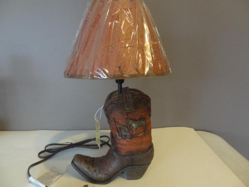 Praying cowboy boot lamp including ...