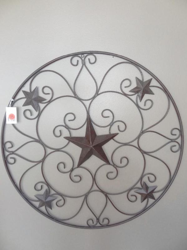 Metal star with scrolls wall hangin...