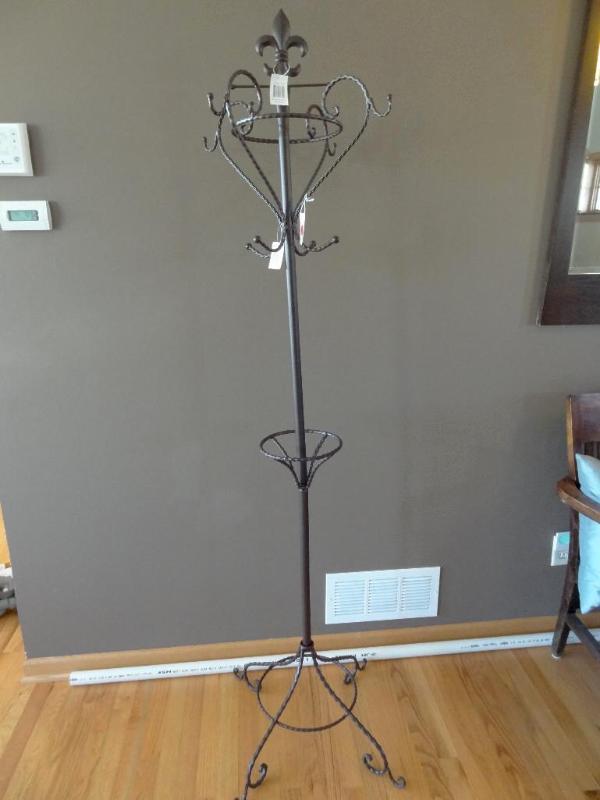 Rod iron fleur de lis coat and umbr...