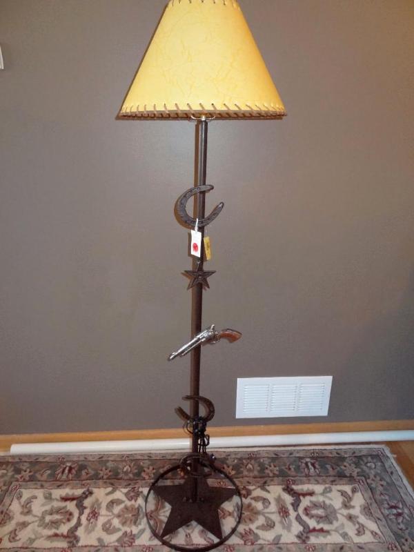 Metal pistol horseshoe floor lamp....